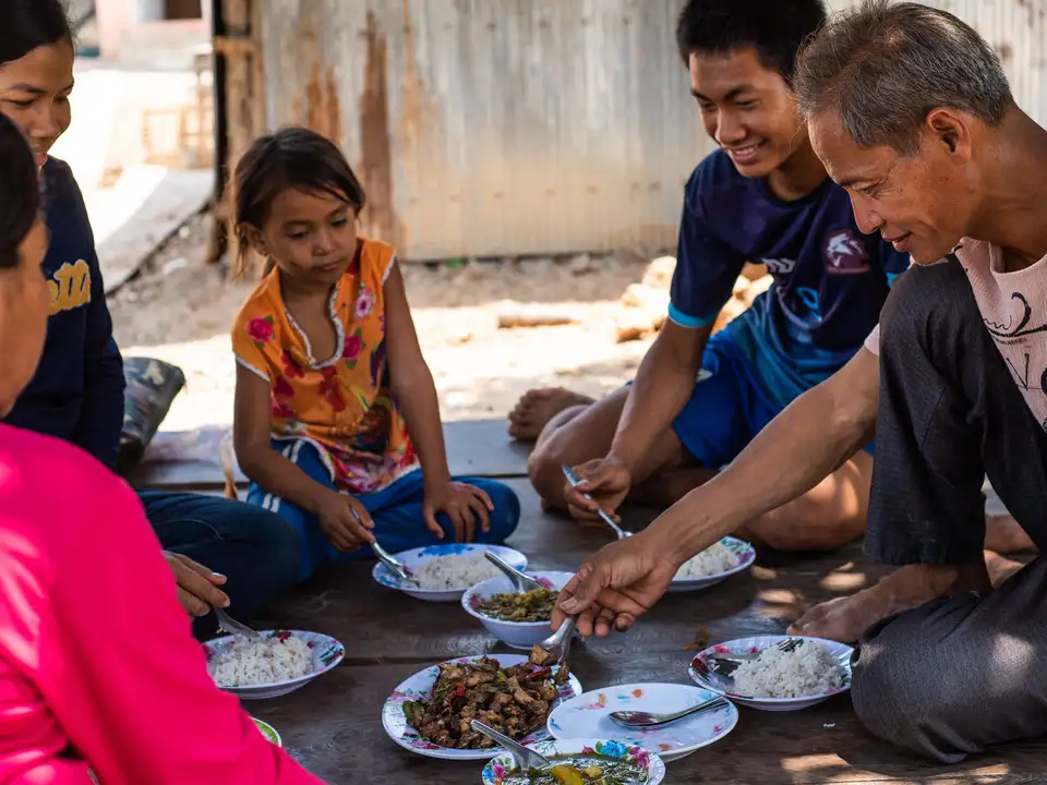 Min Sarith teaching families how to grow sustainable food